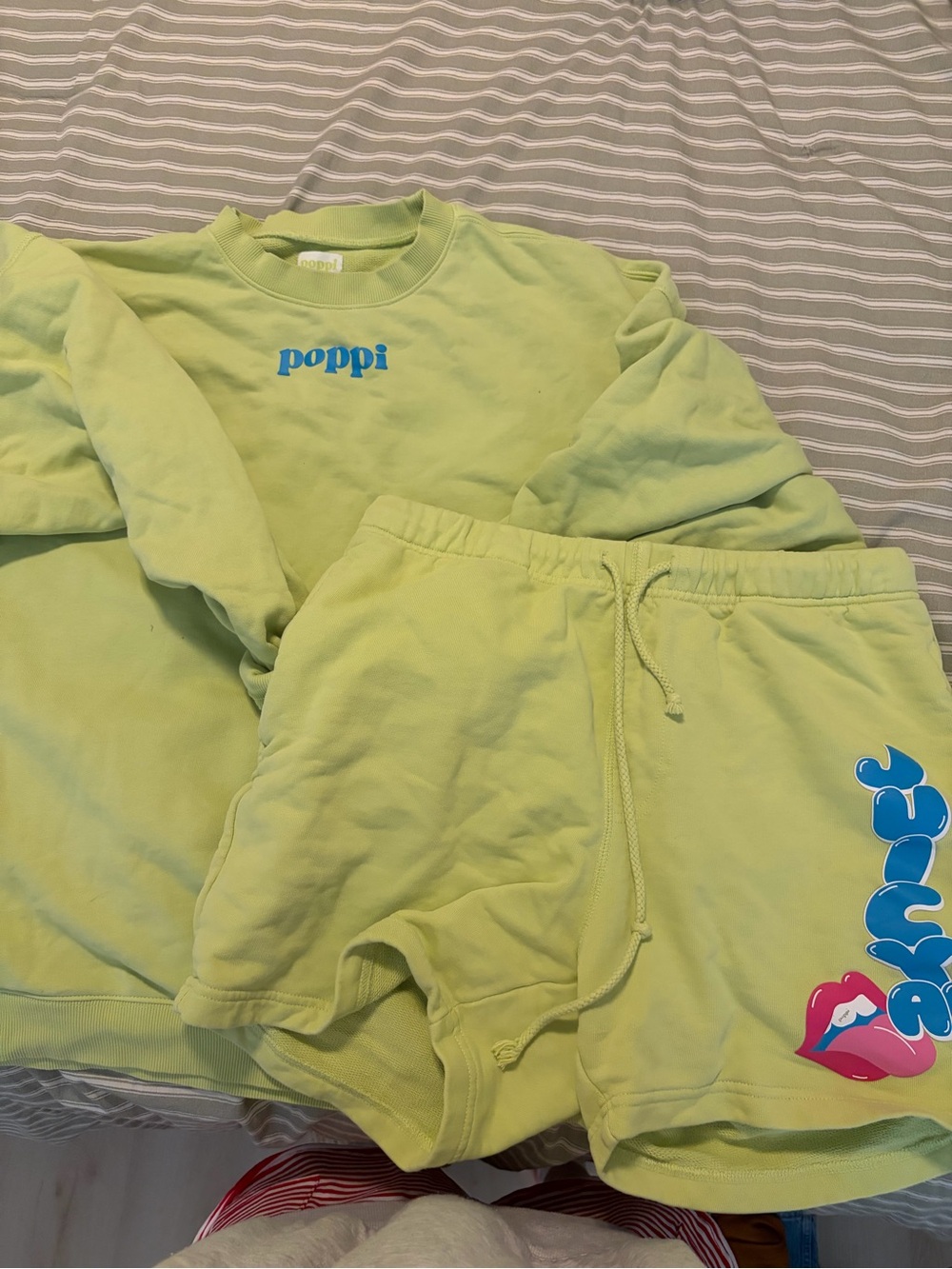 poppi lime green sweatshirt with blue logo
